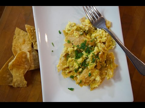 Migas with scrambled eggs, tortilla chips and chili peppers