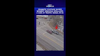 Dramatic Footage Shows Moment Sinkhole Swallows 2 Cars At Traffic Signal In US
