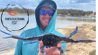 Scooping crabs in the Peel Estuary.