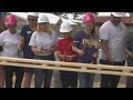 Local realty group helps family in need build new home