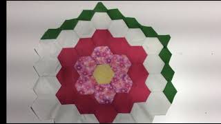 Connecting Flowers in Grandmother's Garden quilt with diamonds