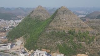 Pyramid mountains in China's Guizhou attract tourists