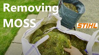 Removing moss in spring with a STHIL scarifier and aerator