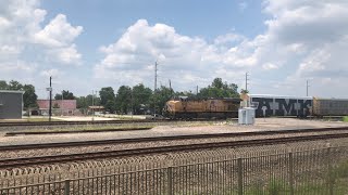 UP 8148 leads autorack train through Rosenberg, TX