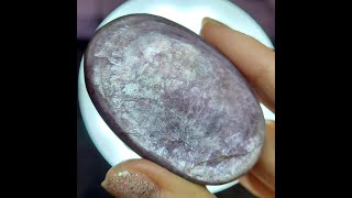 Gem lepidolite palm stone with rainbows