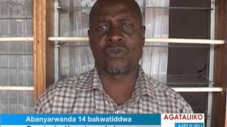 Abanyarwanda 14 bakwatiddwa