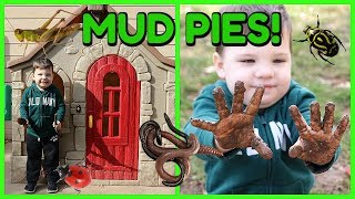 Kid Playing Outside In The Mud Making Mud Pies In Playhouse and Playing with Bugs