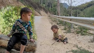 Poor child sitting in the middle of the road what will happen when no one saves