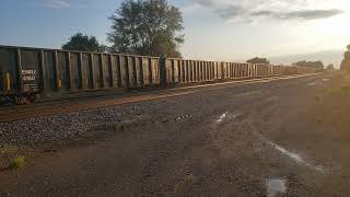 East bound gondola train BNSF # 5036 BNSF # 1085. DPU BNSF # 5707