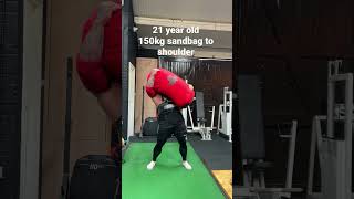 21 year old strongman ollie clarke 150kg sandbag to shoulder