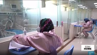 Afghan doctors battle Covid-19 as civil war rages