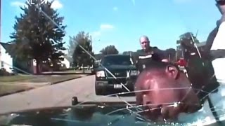 Man Suing for 'Excessive Force' After Police Break Windshield with Suspects Head