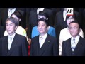 Abe unveils new Japan cabinet after reshuffle