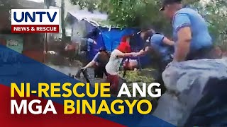 Mga pulis, sinagip ang ilang residente sa Southern Luzon na apektado ni #AghonPH