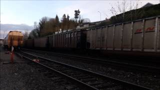 An all-EMD consist leads a coal train on the Ruston waterfront, 4/8/2017