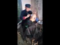 cleanly shaved head in traditional chinese barber shop