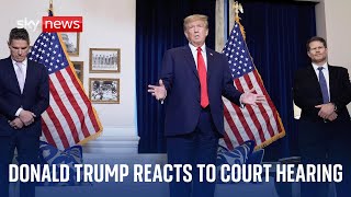 Former US President Donald Trump holds news conference after court appearance