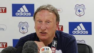 Neil Warnock celebrates Cardiff’s promotion to the Premier League