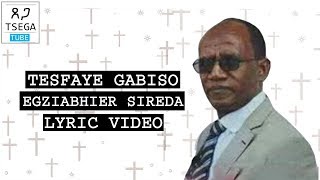 Tesfaye Gabiso - Egziabhier Sireda || እግዚአብሔር ሲረዳ (Lyric video) : Tesga Tube