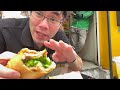 eating a vegan banh mi in saigon bánh mì xanh