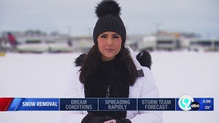 Crews at SYR Hancock International Airport work to keep runways clear of snow and ice