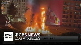 Fire crews work to put out DTLA two-story building blaze