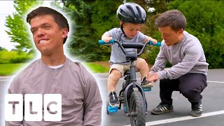Zach Teaches Son Jackson How To Ride A Bike Despite His Bowed Legs | Little People Big World