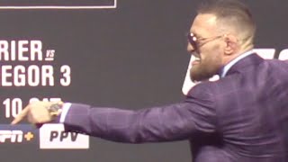 Conor McGregor steals Dustin Poirier’s Hot Sauce | UFC 264 Press Conference