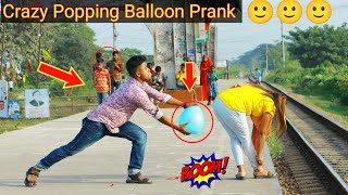 Crazy Popping Balloon Prank on cute Girl | Popping Balloons with Public Reaction | By Razu prank tv