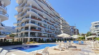 Cozy 2 bedroom apartment in a holiday complex with pools in the city center of Girne Ak1