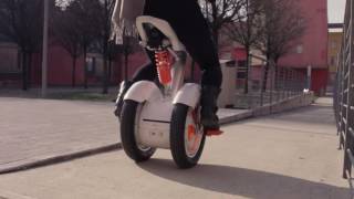 a beautiful girl show you how to drive an Airwheel Smart E Bike A3 elegantly