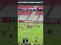 James Conner takes a snap at the Cardinals practice