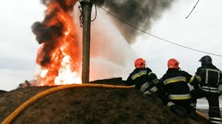 Ukrainian firefighters extinguish fire at fuel and storage depot | AFP