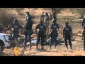 South Africa rights group launches probe in shootings of miners