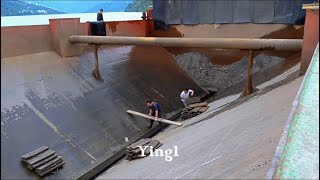 Barge unloading 3100 tons of cobblestone!  Video completed.