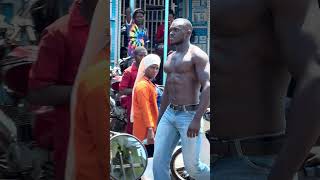 African bodybuilder walking shirtless in public 😱 no music copyright #africangia