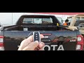 toyota hilux electric roller shutter automatic tonneau cover with roll bar 2021