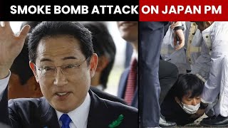 Japan PM Kishida Attacked With Smoke Bomb During Speech | NewsMo