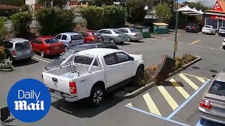 Car thieves ram cop car in stolen ute leaving McDonald's drive-thru - Daily Mail