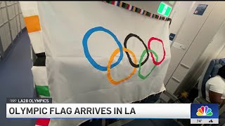 NBC4's Colleen Williams returns to LA from Paris with Olympic flag