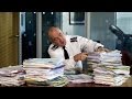 Chief Inspector Cameron Miekelson (Jack Docherty) measures crime rate - Scot Squad