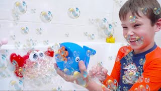 Katy and Max playing with Bath bubbles