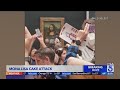 Man throws cake at glass protecting Mona Lisa