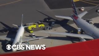 Planes clip wings at Boston airport as holiday travel begins