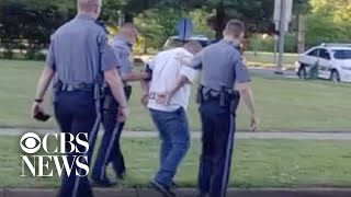 KKK leader arrested after driving into protest in Virginia