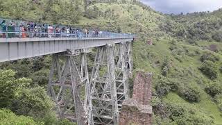 View of bridge from heritage train to patalpani and kalkund with  vistadome AC chair car.