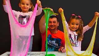 Папа и девочки играют и делают разноцветные слаймы / Magic Twins