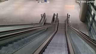 Long Escalators in Heathrow Airport London