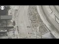 Cars slide on icy roads in Texas