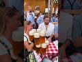 13x beer steins in one hand shorts